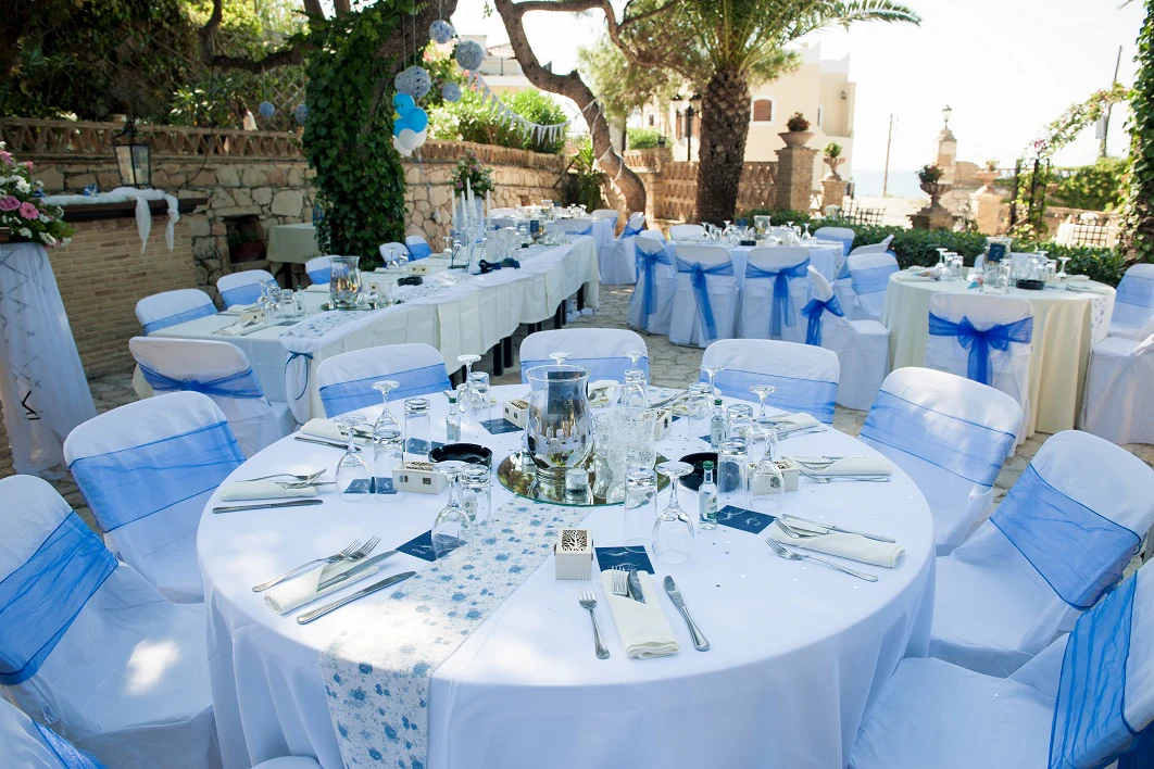 wedding with round tablecloth, chair cover and chair sashes